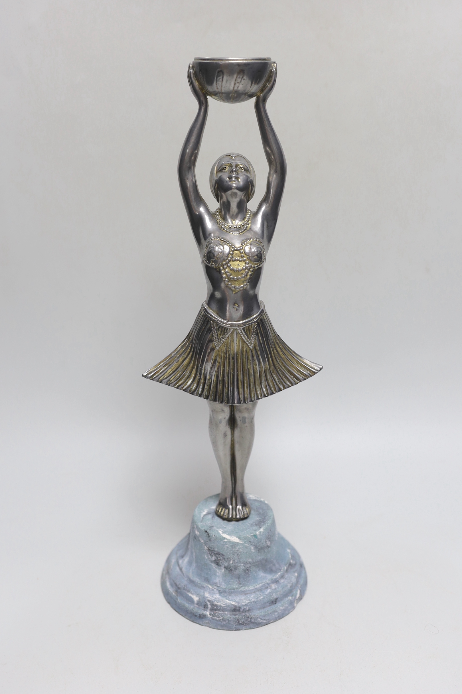 A French Art Deco spelter figure of a dancer, standing on a marble base, 39cm high